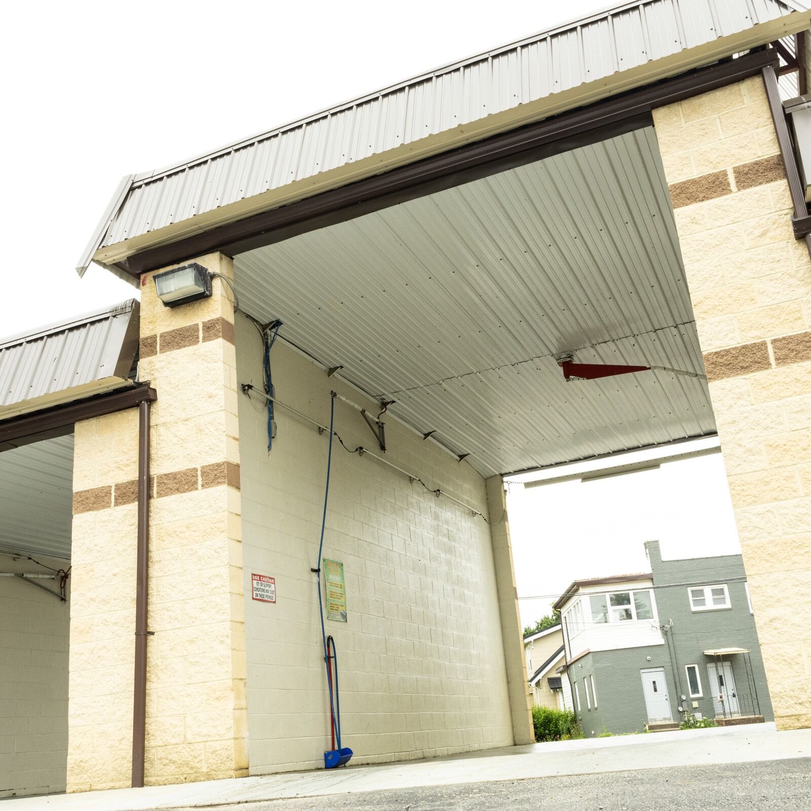 Self-serve wash bay entrance at Quick Clean Car and Truck Wash