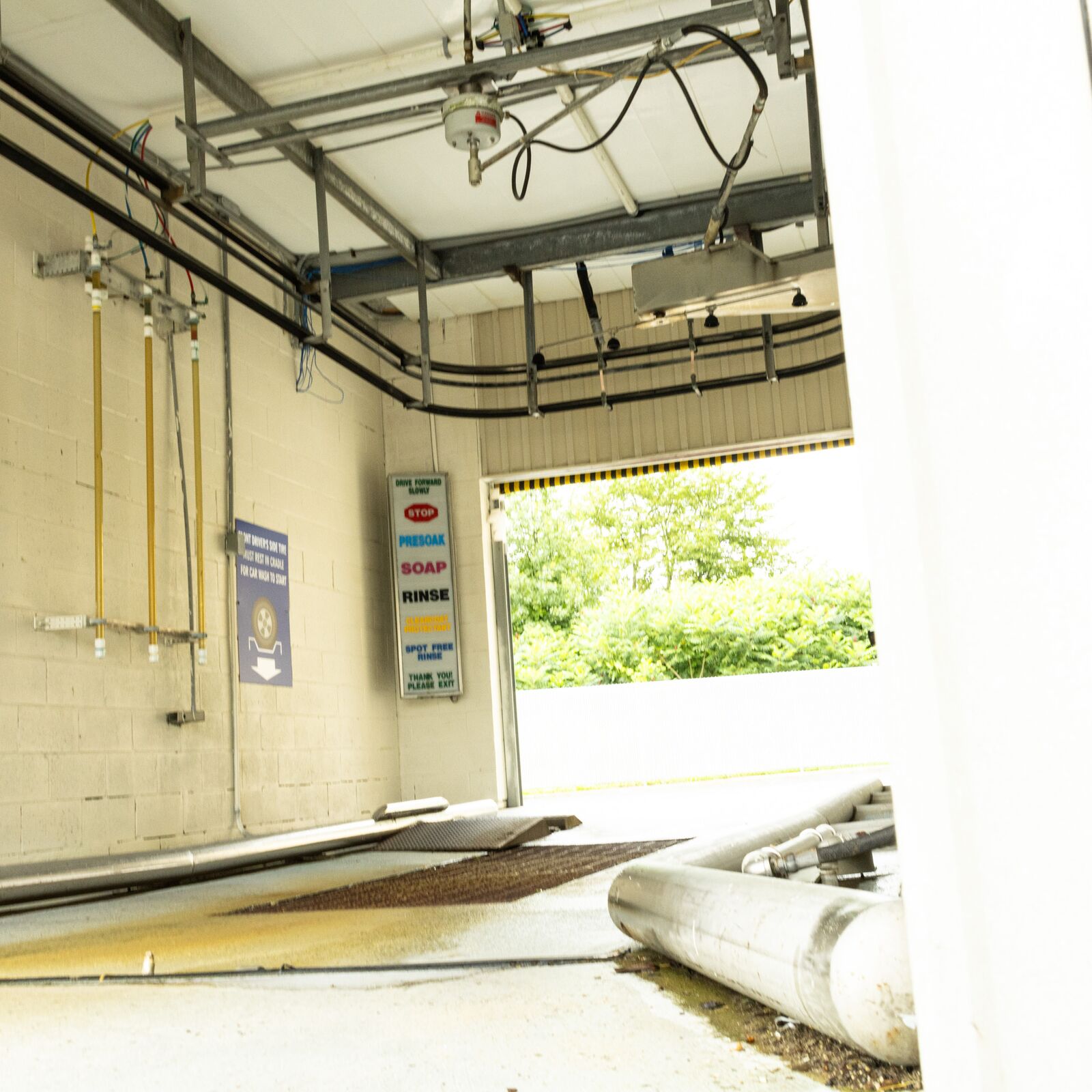 Self-serve wash bay equipment and pressure washer wand