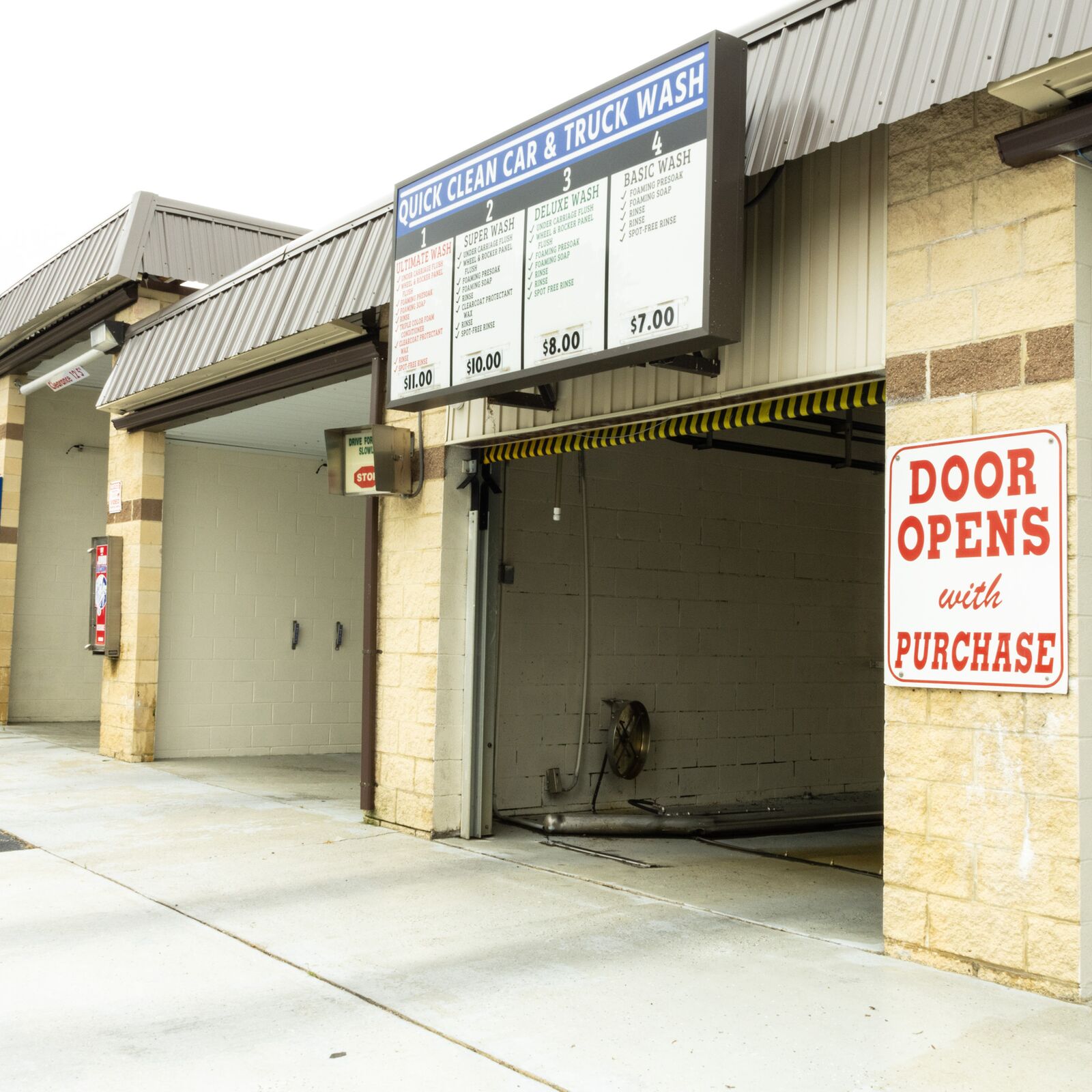 Deluxe wash bay exterior at Quick Clean Car and Truck Wash