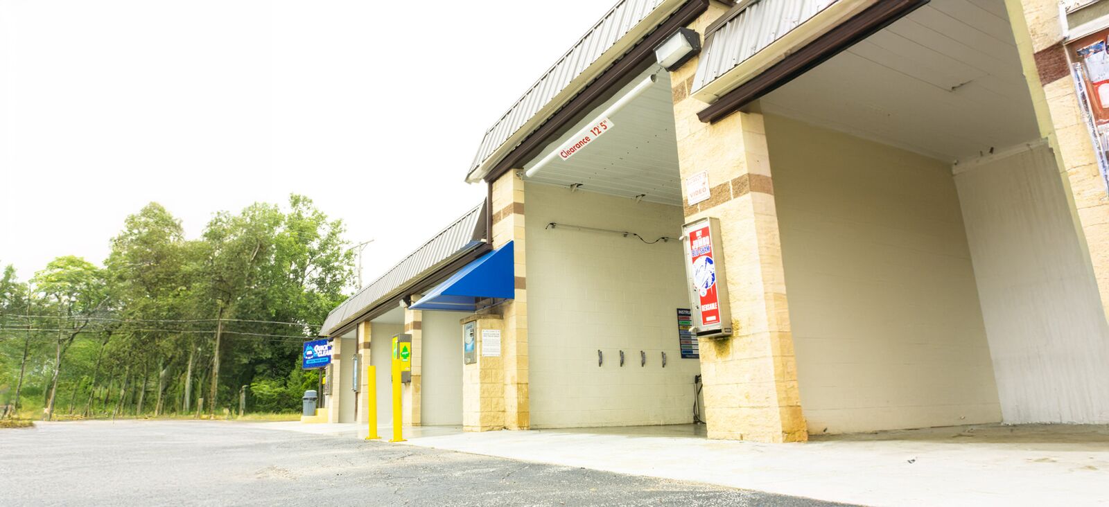 Wide exterior view of Quick Clean Car and Truck Wash along Crawford Road