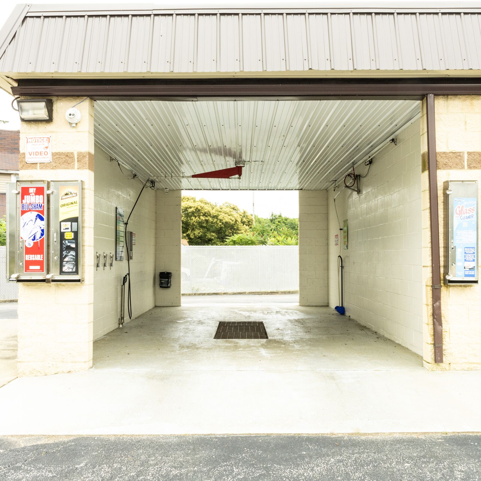 Automated wash tunnel entrance at Quick Clean Car and Truck Wash
