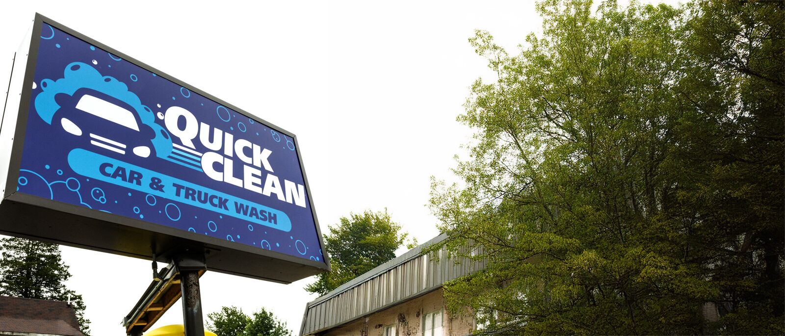 Quick Clean Car and Truck Wash sign close-up